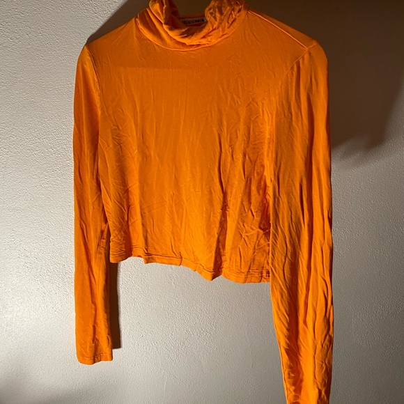 orange cropped turtleneck